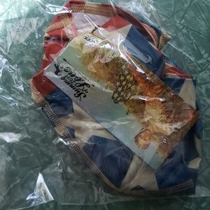 Never worn Teeki flag shorts